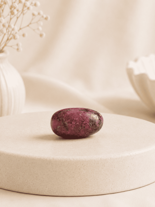 Natural Rhodonite Tumble Stone crystal for emotional healing, love, forgiveness, heart chakra balancing, peace, and positive energy